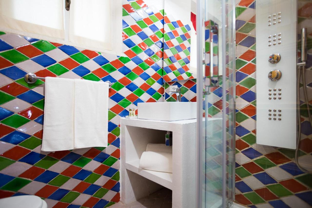 Palmasera Charming Suites Cala Gonone Bagian luar foto