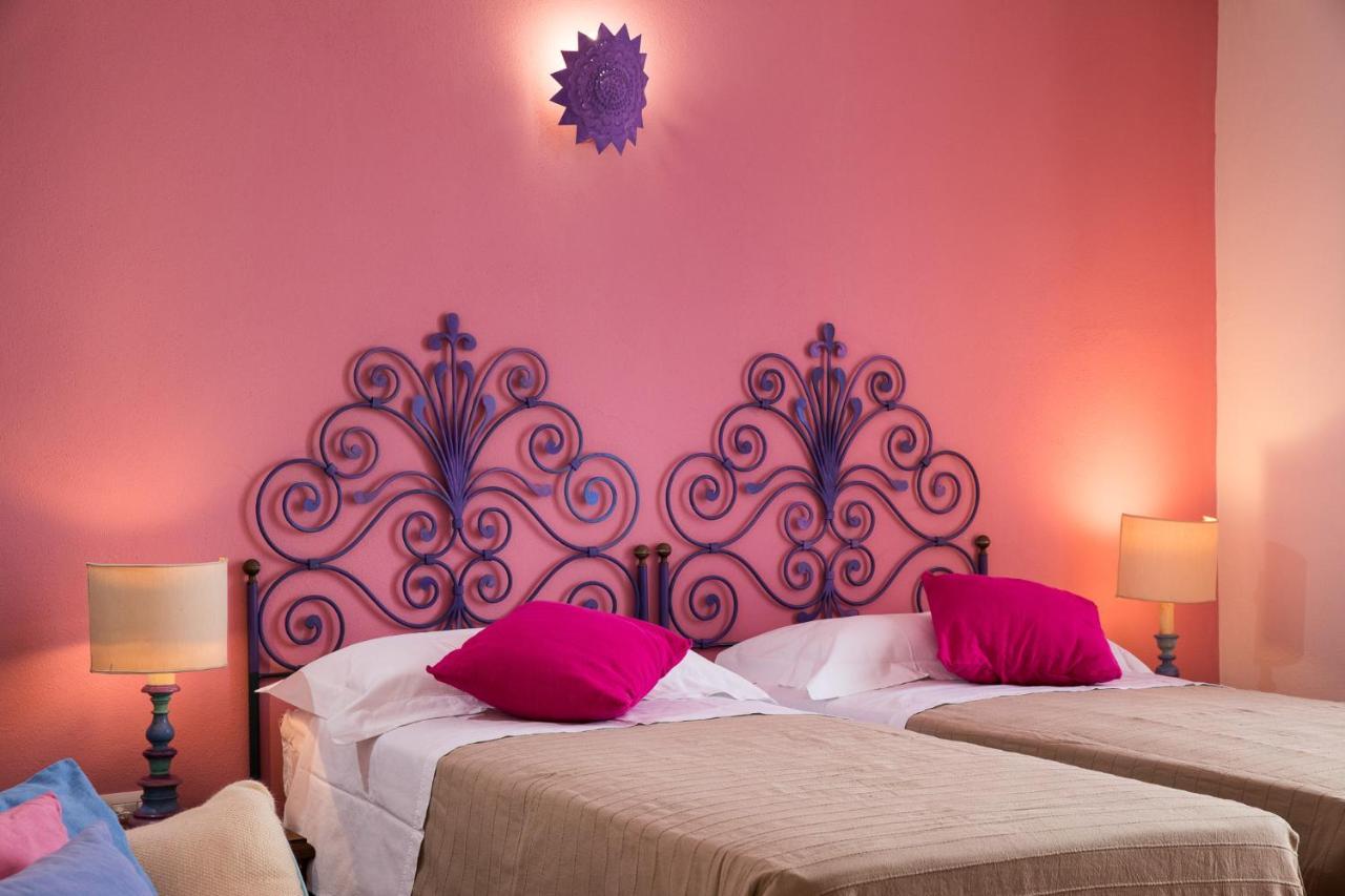 Palmasera Charming Suites Cala Gonone Bagian luar foto