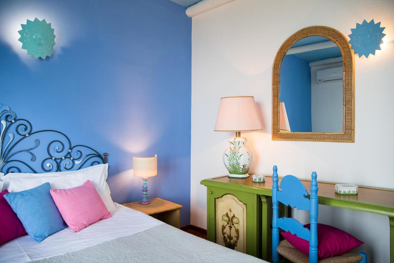 Palmasera Charming Suites Cala Gonone Bagian luar foto